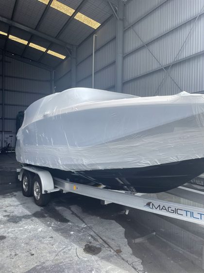 Shrink wrapped boat